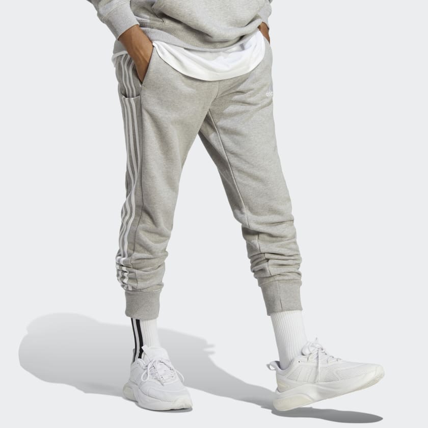 Essentials_French_Terry_Tapered_Cuff_3-Stripes_Pants_Szary_IC9407_25_model
